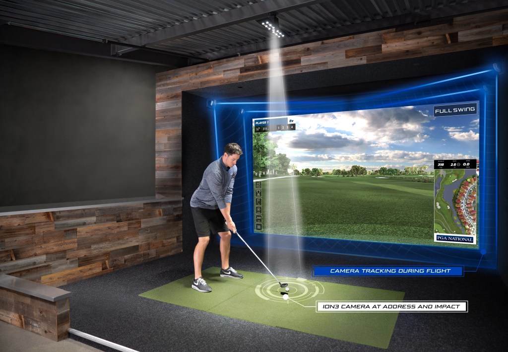 golfer lining up swing on the simulator